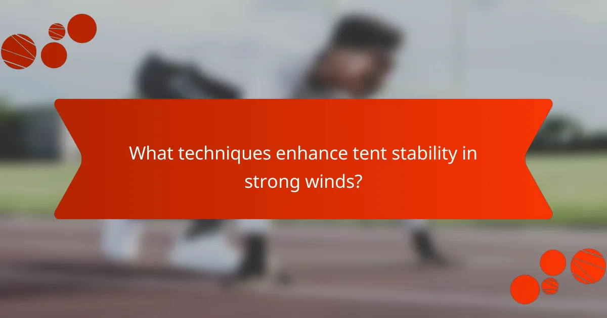 What techniques enhance tent stability in strong winds?